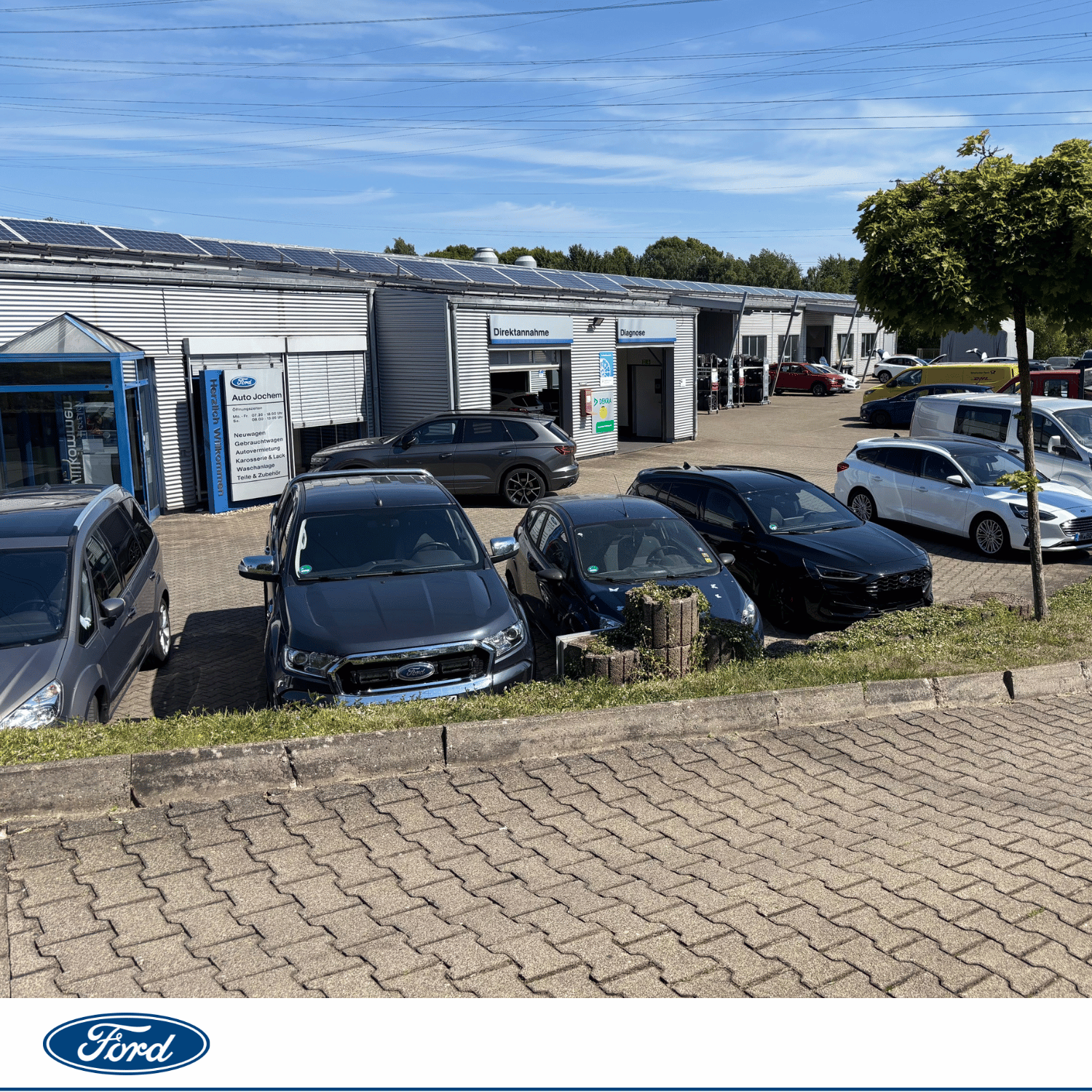 Ford Standort Illingen | Jochem Gruppe Ford Standort Illingen | Jochem Gruppe | Das Bild zeigt den das Gebäude mit Fahrzeugen davor.